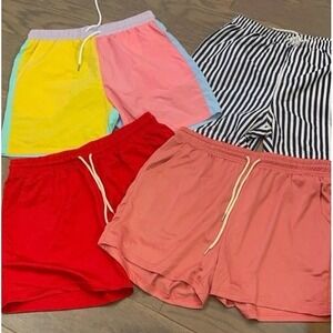 NEW without tags four pairs of men's size large shorts.